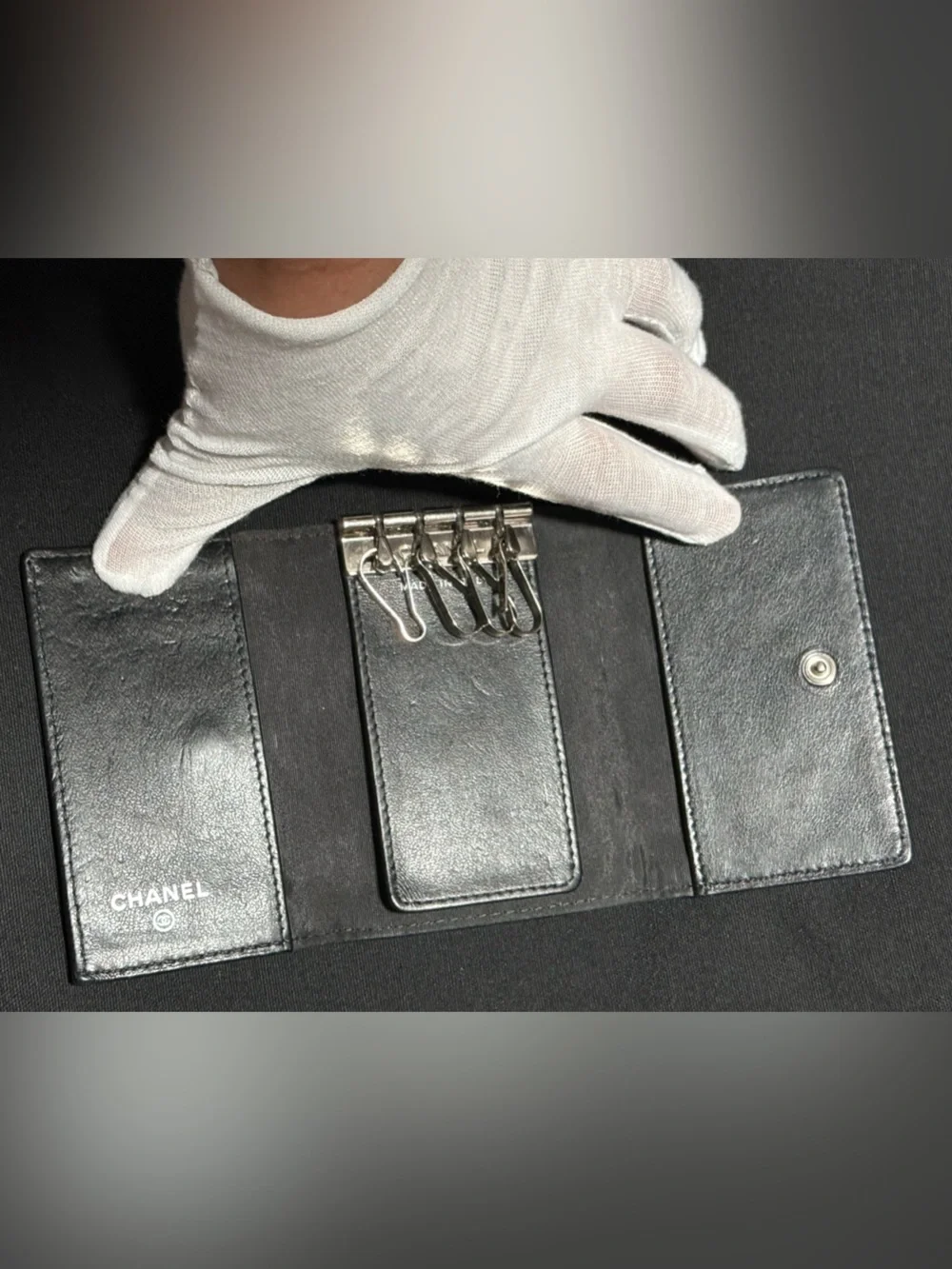 CHANEL Black Camellia-Embossed Leather Small Wallet